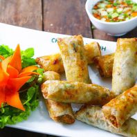 Eating Banh Khot In Vietnam